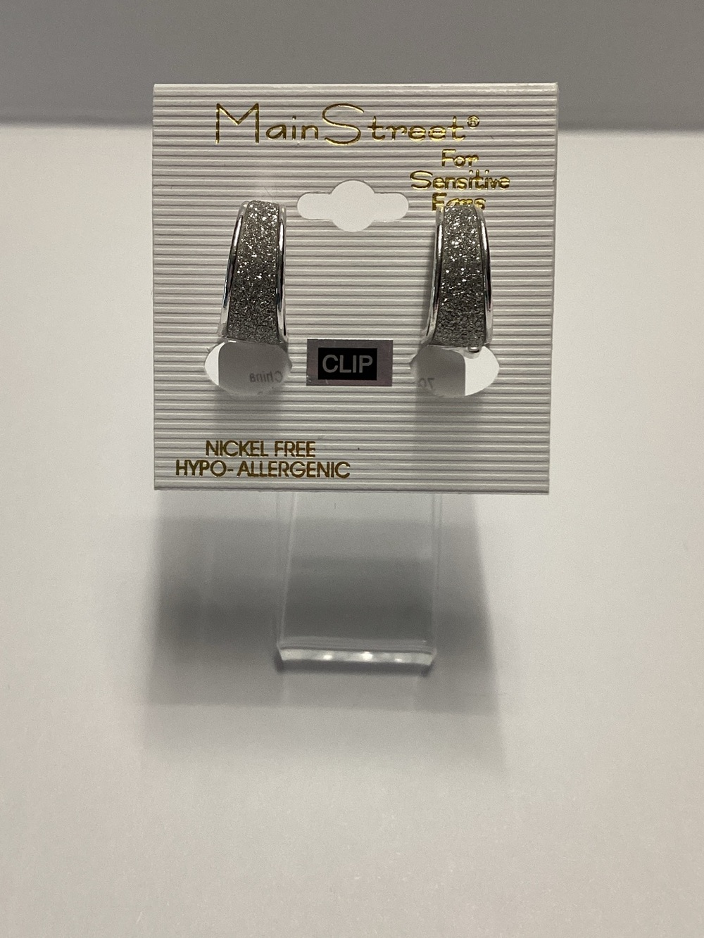 Main Street Silver Glitter Clip-On Hoop Earrings – Hypoallergenic